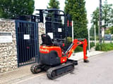 2015 Kubota U10-3 mini excavator, rear three-quarter view