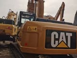 2016 Caterpillar 323DL crawler excavator, rear three-quarter view