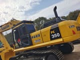 2023 Komatsu PC350 crawler excavator, rear three-quarter view