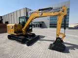 2023 Caterpillar 305.5E2 mini excavator, side view