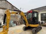 2023 Caterpillar 303CR mini excavator, side view