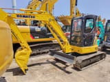 2018 Komatsu PC-55MR mini excavator, front three-quarter view