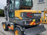 2021 Volvo EW60E wheel excavator, rear three-quarter view