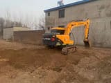 2023 Hyundai R110VS mini excavator, rear three-quarter view