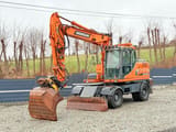 2012 Doosan DX160W wheel excavator, side profile view