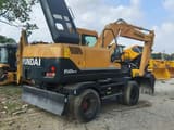 Hyundai 150W-9 wheel excavator rear three-quarter view