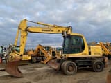 1998 Komatsu PW170ES wheel excavator, side view