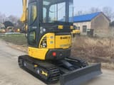 2023 Komatsu PC35 MR mini excavator, rear three-quarter view