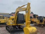 2023 Komatsu PC70-8 mini excavator, front three-quarter view