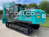 2026 Kobelco SK220 crawler excavator, rear three-quarter view