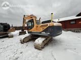 2015 Hyundai 220LC-9A crawler excavator, rear three-quarter view
