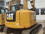 Caterpillar 308E crawler excavator, rear three-quarter view