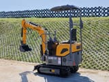 2025 APS KME10 mini excavator, rear three-quarter view