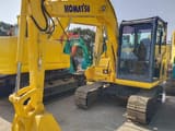 2022 Komatsu PC60-8 mini excavator, front three-quarter view