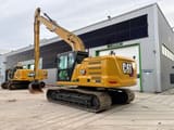 2022 Caterpillar 323 SLR excavator, rear three-quarter view