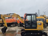 2022 Caterpillar 305.5E2 mini excavator, side view