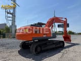 2025 Hitachi Zaxis 210 crawler excavator, rear three-quarter view