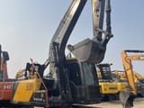 2023 Volvo EC140 crawler excavator, front three-quarter view