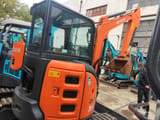 Hitachi ZX35 mini excavator, side view
