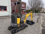 2025 New Holland E14D mini excavator, rear three-quarter view