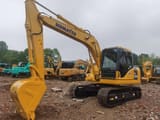 Komatsu PC130 crawler excavator, side view
