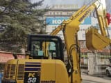 2025 Komatsu PC58 mini excavator side view