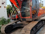 2024 Doosan DX225LC-9C crawler excavator, front three-quarter view