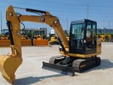 2022 Caterpillar 305.5 mini excavator, side view