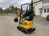 2021 Caterpillar 300.9D mini excavator, rear three-quarter view