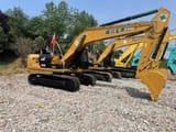 Гусеничный экскаватор 2021 Caterpillar 320D2, вид сбоку