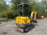 2018 New Holland E18C mini excavator, rear three-quarter view