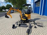 Berger Kraus BK1300JSR mini excavator with attachments, side view