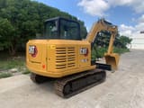 2022 Caterpillar 305.5E2 crawler excavator, rear three-quarter view