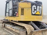 2018 Caterpillar 335FLCR crawler excavator rear three-quarter view