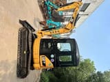 2023 Caterpillar 303CR mini excavator, side view
