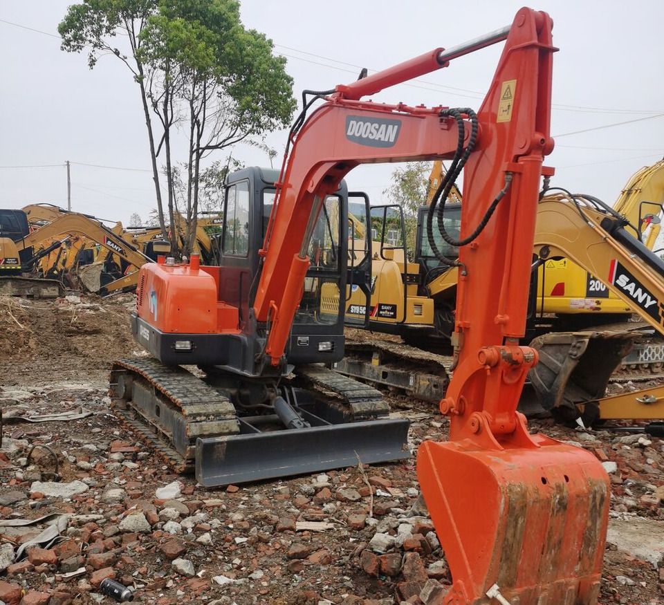 Doosan DH55 crawler excavator, front three-quarter view Doosan DH55 crawler excavator, front three-quarter view