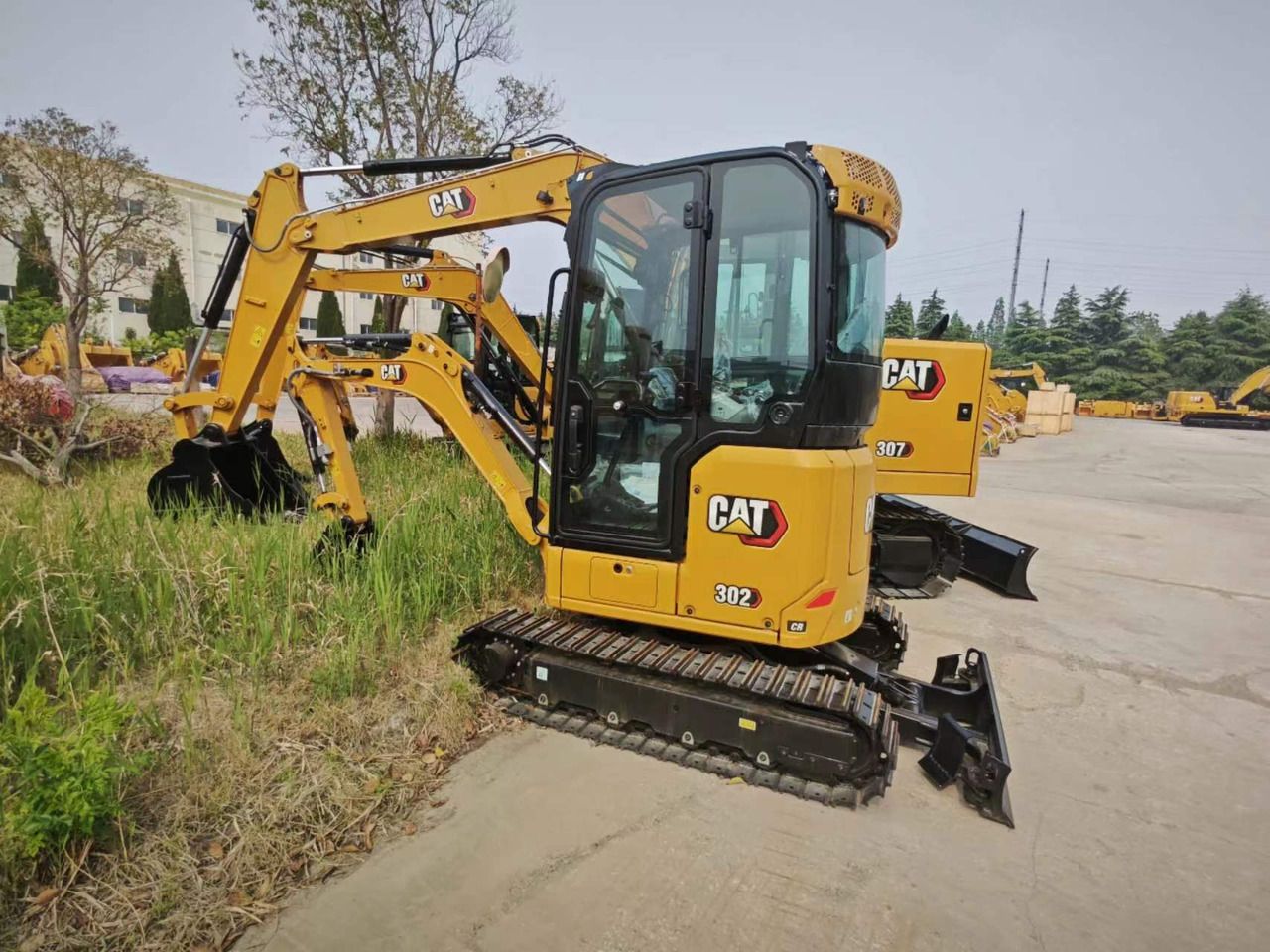 2026 Caterpillar 302CR mini excavator, front three-quarter view 2026 Caterpillar 302CR mini excavator, front three-quarter view