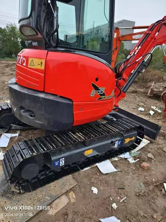 Kubota U-35 mini excavator, rear three-quarter view Kubota U-35 mini excavator, rear three-quarter view
