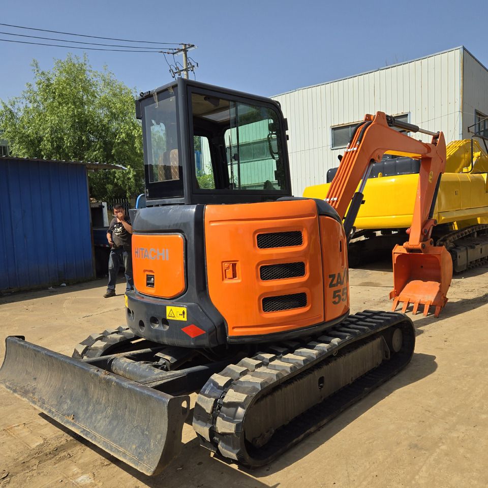 2023 Hitachi ZX55 mini excavator, front three-quarter view 2023 Hitachi ZX55 mini excavator, front three-quarter view