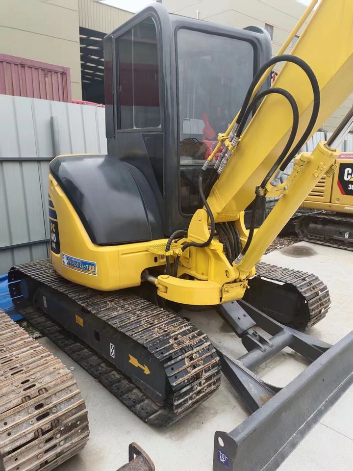 2018 Komatsu PC40 MR mini excavator, rear three-quarter view 2018 Komatsu PC40 MR mini excavator, rear three-quarter view