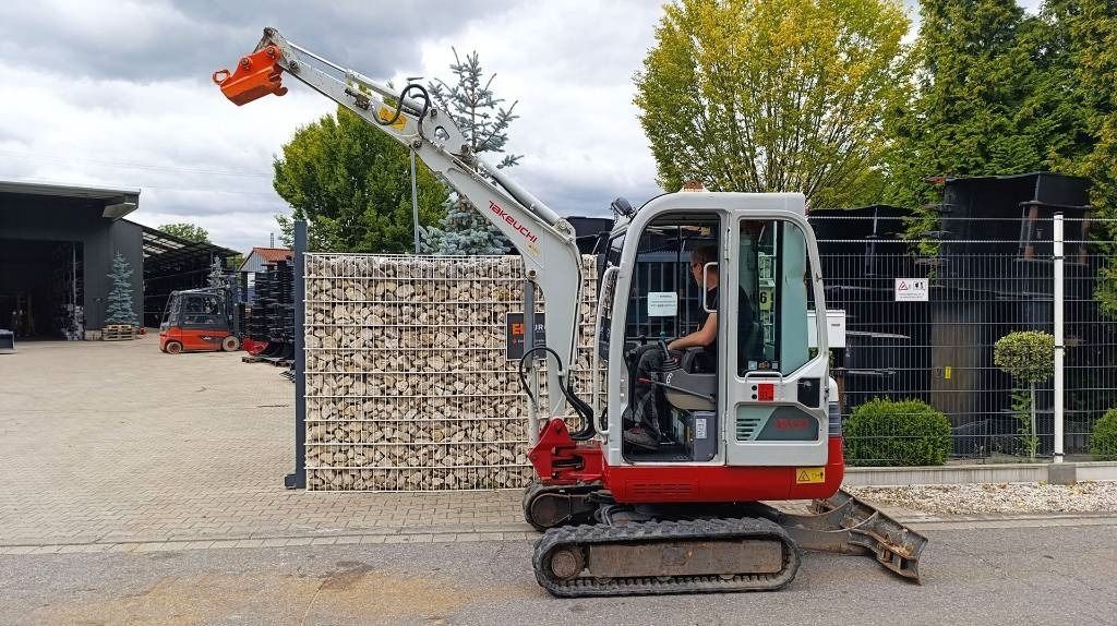 2012 Takeuchi TB219 mini excavator, side view
