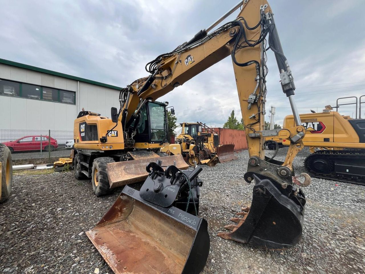 2018 Caterpillar M315F wheel excavator, front three-quarter view