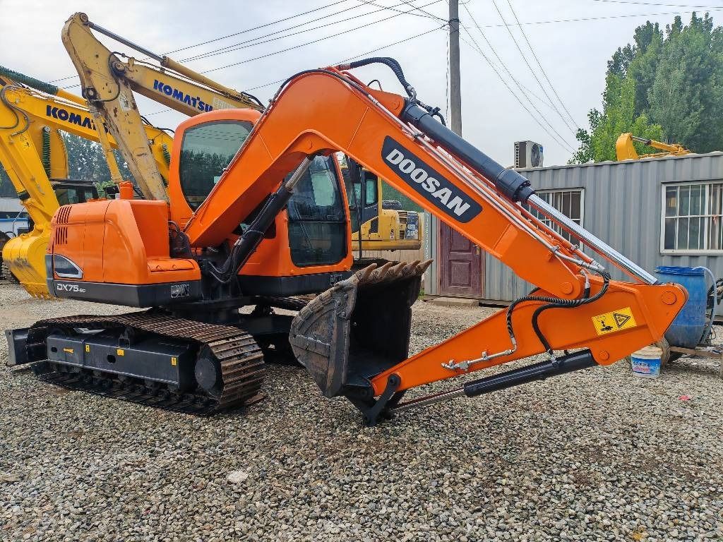 2023 Doosan DX75-9C mini excavator, side profile view