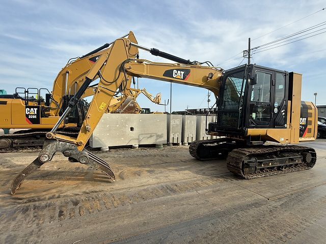 2016 Caterpillar 312E crawler excavator, side view 2016 Caterpillar 312E crawler excavator, side view