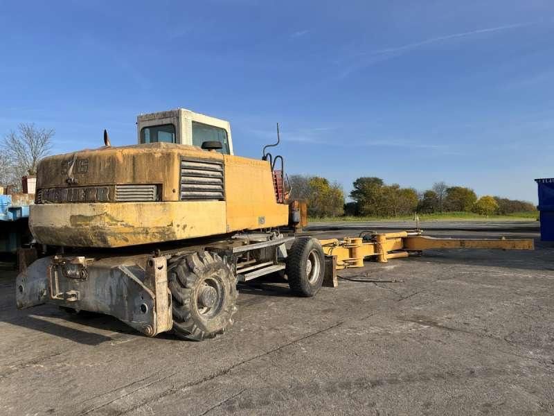 2000 Liebherr A316 wheel excavator, rear three-quarter view 2000 Liebherr A316 wheel excavator, rear three-quarter view