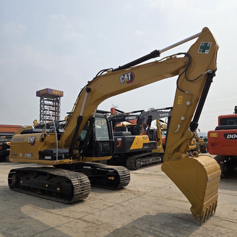 2023 Caterpillar 315D2 GC crawler excavator, side profile view