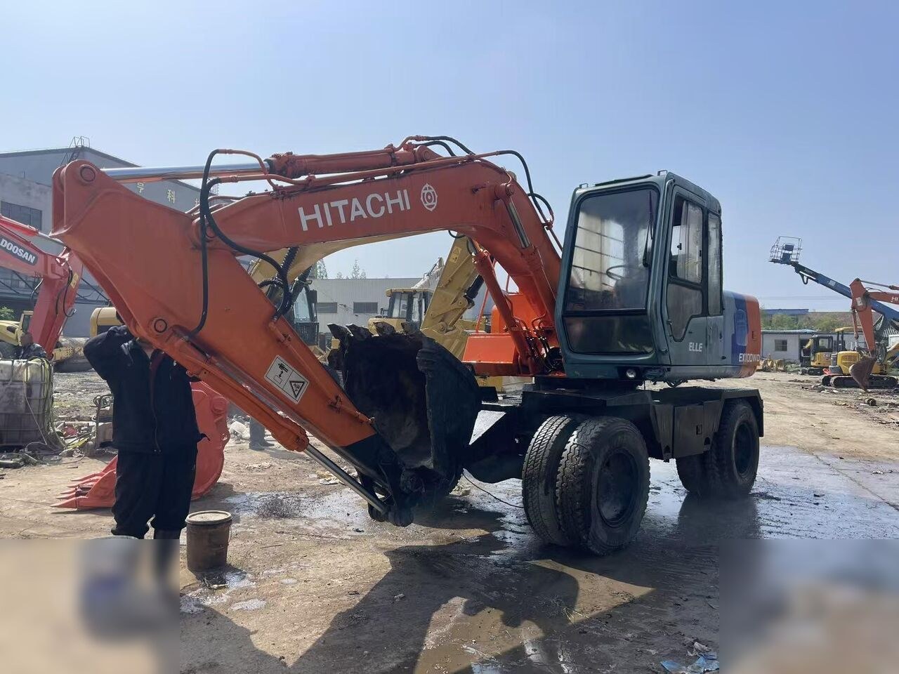 1993 Hitachi EX100W wheel excavator, side profile view 1993 Hitachi EX100W wheel excavator, side profile view