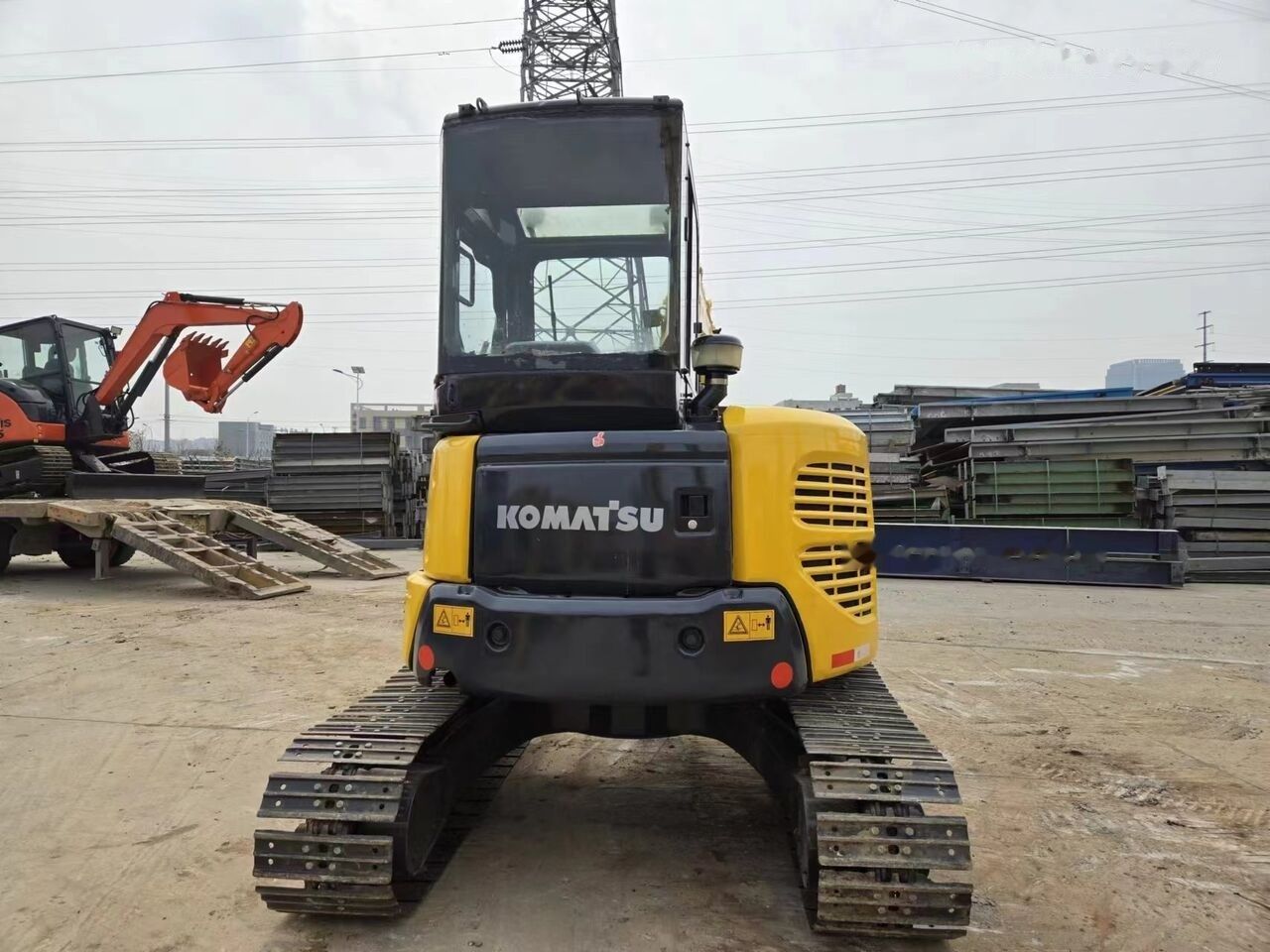 2022 Komatsu PC-55MR mini excavator, rear view 2022 Komatsu PC-55MR mini excavator, rear view