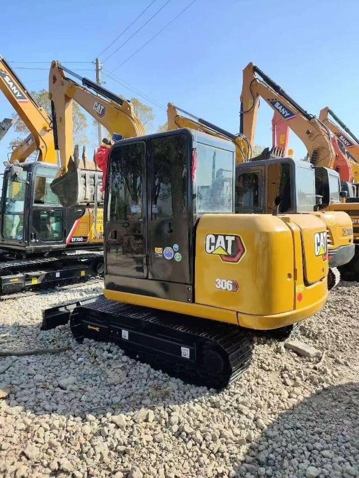 2025 Caterpillar 306 mini excavator, rear three-quarter view 2025 Caterpillar 306 mini excavator, rear three-quarter view