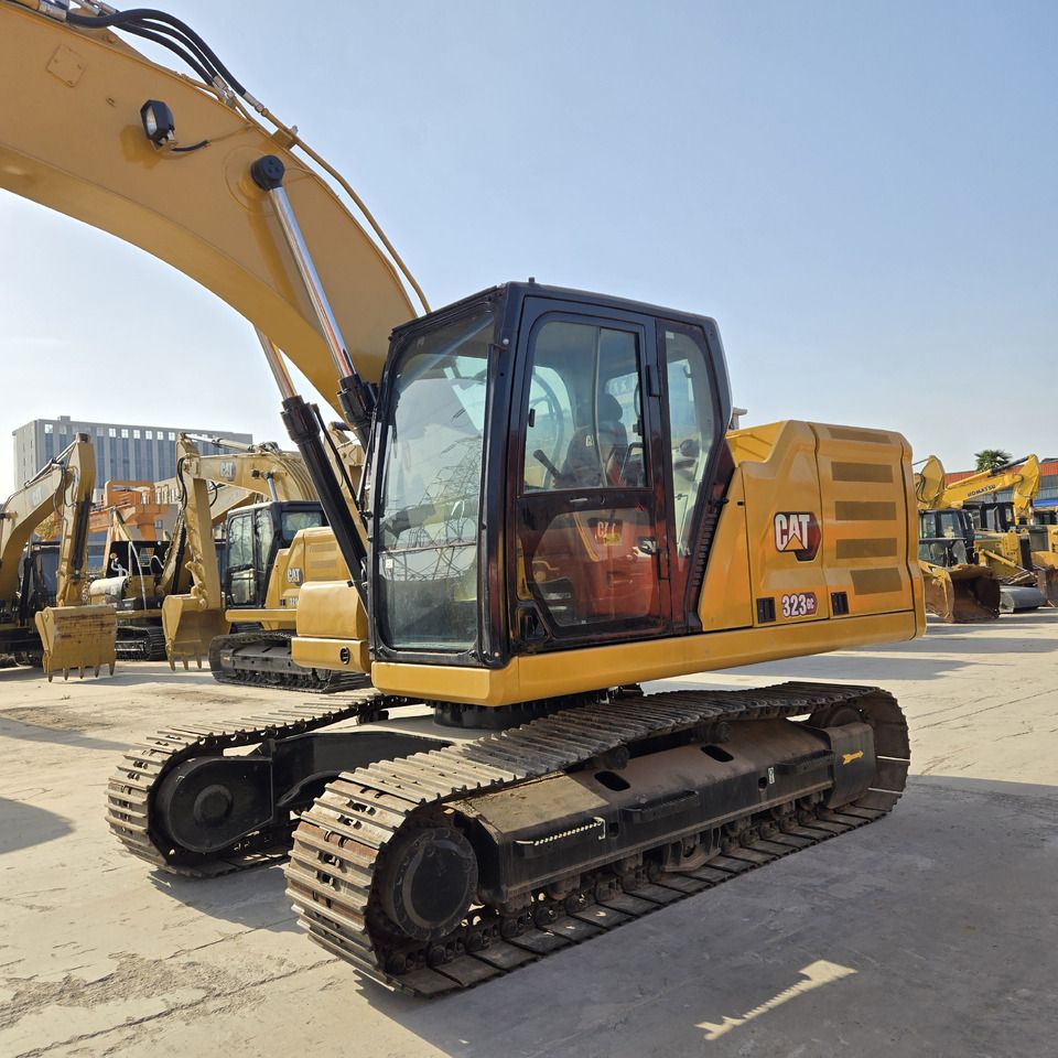 2023 Caterpillar 323GC crawler excavator, side view